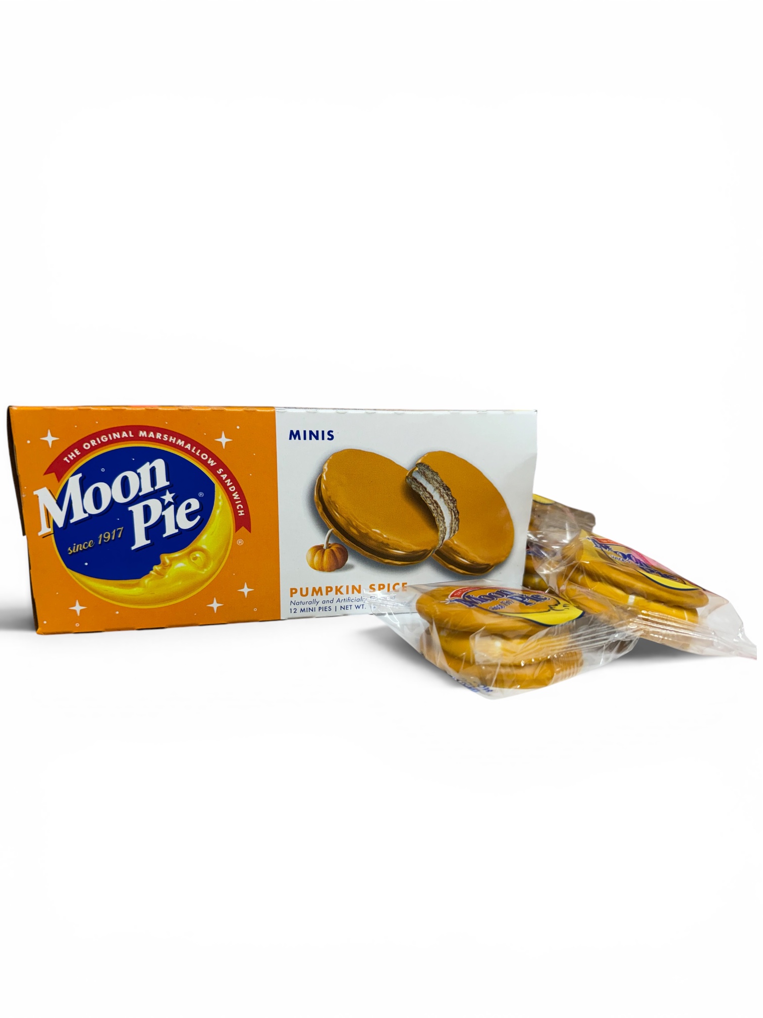 Box of MoonPie Minis Strawberry Shortcake cookies featuring pink strawberry-flavored marshmallow sandwich treats with shortbread cookies, displayed on a table. Packaging highlights dairy-free, nut-free, and egg-free ingredients.